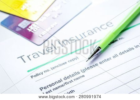 Booking Travel Concept With Insurance On Table Background