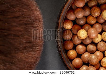 Close Up Of Face Powder Pearls In An Open Powder Box And A Make Up Brush. Feminine Cosmetics And Mak