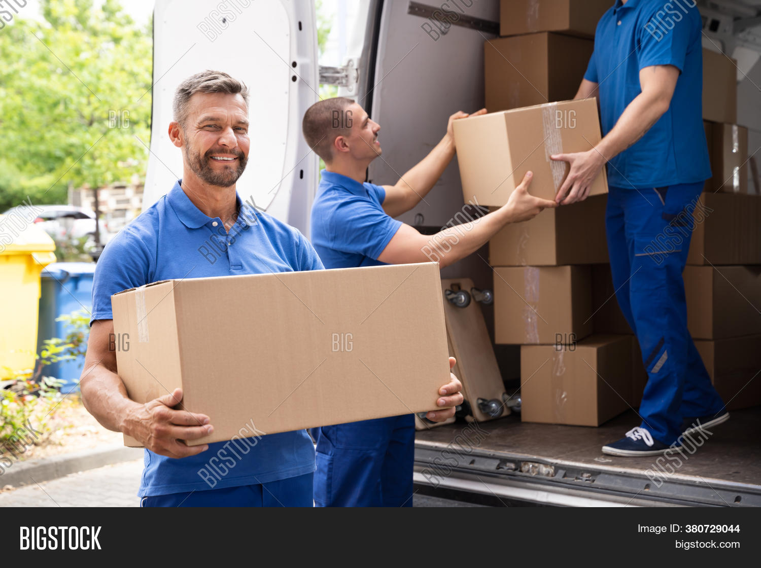 Truck Movers Loading Image & Photo (Free Trial) Bigstock