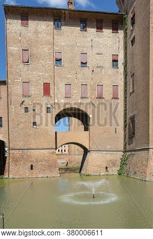 Ferrara, Italy. August 6, 2020. A Panoramic View Of Este Castle In The City Center. Imposing 14th-ce
