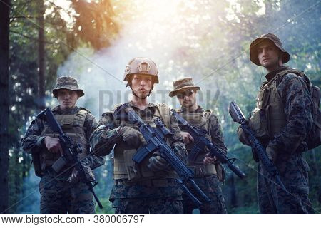 Modern Warfare Soldiers Squad Running in Tactical Battle Formation Woman as a Team Leader
