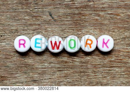 White Bead With Color Letter In Word Rework On Wood Background
