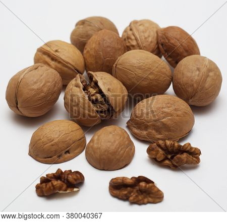 Isolated Walnuts. Broken Walnuts. Tasty Vegan Nuts. Organic Diet Food. Healthy Delicious. Nutshell A