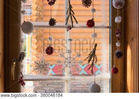 The Window Is Decorated With Christmas And New Year Decorations. The Concept Of Preparing And Waitin