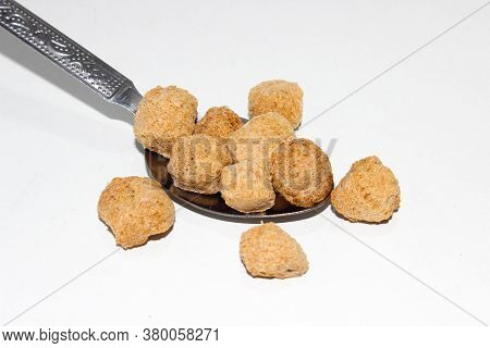 A Picture Of Soya Chunks On White Background