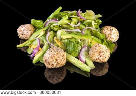 Delicious Salad With Avocado And Snowballs With Reflection, Isolated On Black Background