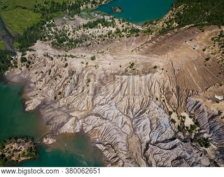Fancy And Unusual Aerial Landscape Of Romantsev Mountains Wih Blue Lakes And Mud Erosion Looks Like 