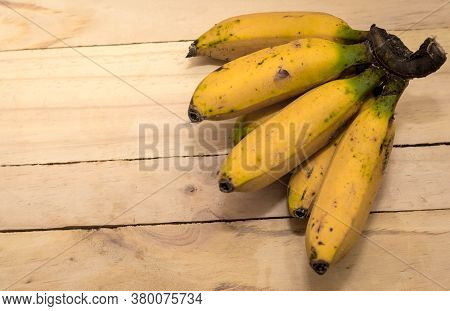 Ripe Yellow Bananas In Wicker Basket, On Wooden Background, View From Above, Yellow Fruits, Yellow B