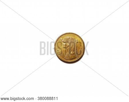 Egyptian Coin Of 50 Piastres, Made Of Copper, Lies On A White Background, Reverse