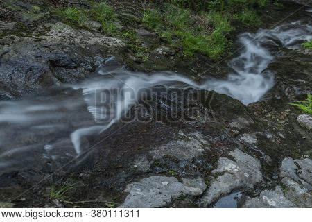 Waterfall On Divoky Creek Near Kouty Nad Desnou Village In Summer Day