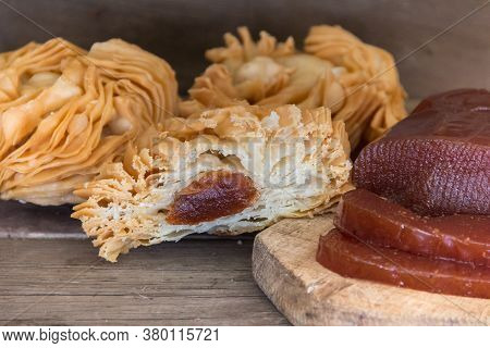 Fried Puff Pastry Cakes, Filled With Sweet Potato And Quince Paste. Traditional Argentine Dessert