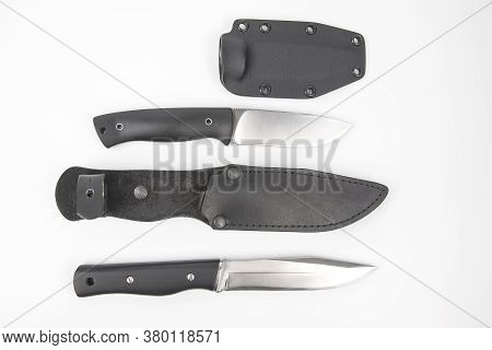 Knife For Camping And Hunting In A Plastic And Leather Case On A White Background.  Cutting Tool. Is
