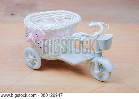 Toy White Tricycle On A White Background