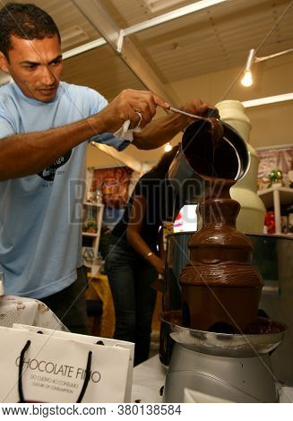 Ilheus, Bahia / Brazil - July 7, 2011: Melted Chocolate Machine Is Seen At A Cocoa Exhibition Fair I