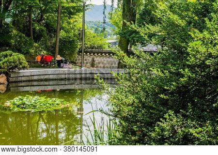 Geumsan, South Korea; July 21, 2020: For Editorial Use Only. Unidentified Person Wearing Straw Hat P