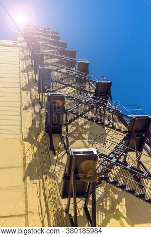 Stairway To Heaven Concept. Fire Escape Staircase Of Grain Elevator.