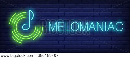 Melomaniac Neon Sign. Glowing Inscription With Blue Tone And Green Radio Waves On Brick Wall Backgro