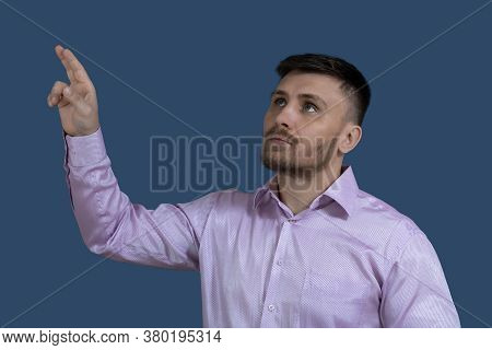 Nice Man Points Up. The Man Is Pointing At Something.