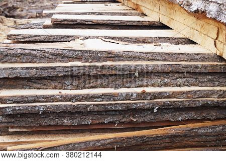 Unedged Lumber, Stacked Open Air Close Up