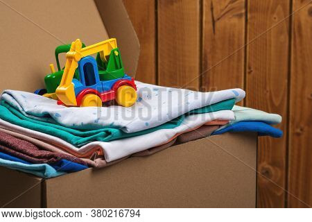 Donation Box With Children's Things, Toys. Donation Box Full With Stuff For Donate. Help Poor. Case 