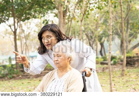 Doctor Help And Care Asian Senior Or Elderly Old Lady Woman Patient Sitting On Wheelchair At Nursing
