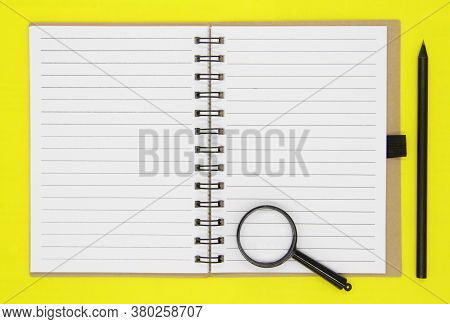 Back To School. Educational Concept, Office Supplies. Craft Notebook, Blank Blank Sheets, Black Penc