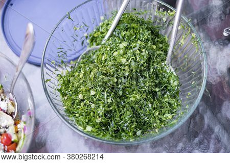 Bowl Of Brazilian Collard Greens (couve) On The Dinner Table