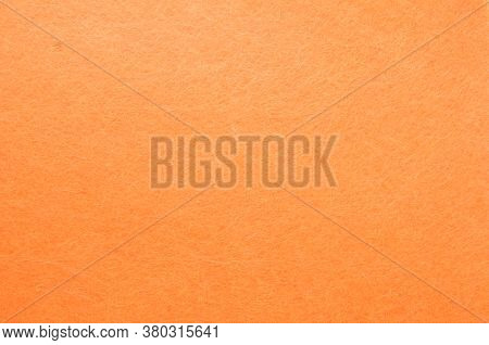 Texture Background Of Orange Velvet Or Flannel