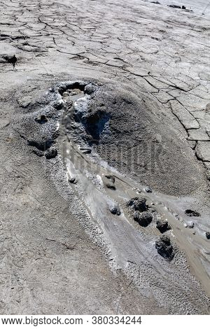 Mud Geyser Or Mud Volcano. Geological Formation. Particular Hydrogeological Conditions Generally All