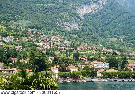 Lenno ?ommune on Como Lake. Lombardy. Italy. Picturesque Italian Landscape with Old Town. Stunning Panorama with Mountains and Forest.