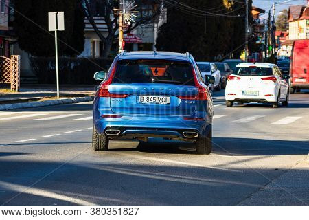 Back View Of A Blue Luxury Family Car Volvo Xc60 On A Street In Bucharest, Romania, 2020.