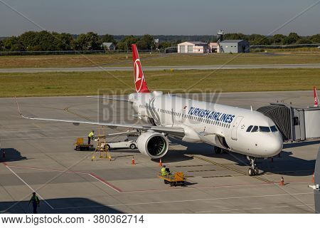 Lviv, Ukraine - 09 Aug 2020: Turkish Airlines Passenger Plane Unloads Baggage At The Lviv Lwo Danylo