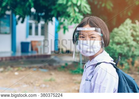 Kanchanaburi,thailand-july 2,2020:unidentified Elementary School Students Wear Face Mask To Prevent 