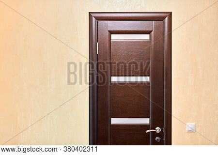 Wooden Door In Room, Copy Space. Closed Interior Door. Entrance To Hotel Apartment.