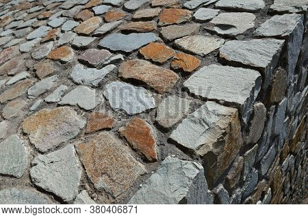 Abstract View Of Modern Diorite Volcanic Rock Masonry With Selective Focus