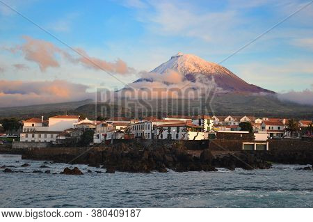 The Highest Mountain Of Portugal, The Azores Volcano Montanha Do Pico On The Island Of Pico At Sunse