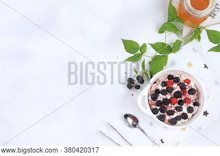 Cottage Cheese With Raspberries, Honey And Blackberries, Selective Focus. Usefu Natural Breakfast Wi