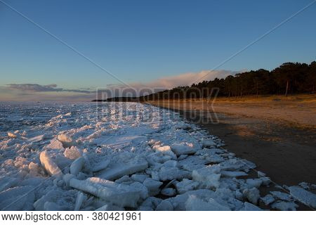 Spring Sunset Over The Melting Ice Of The Gulf Of Bothnia