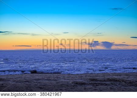 Spring Sunset Over The Melting Ice Of The Gulf Of Bothnia