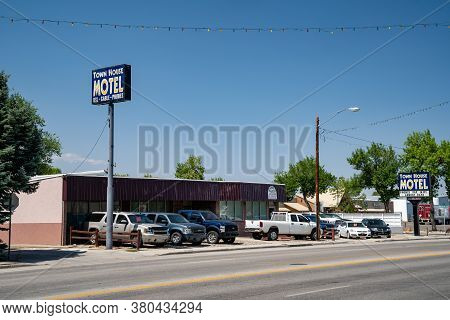 Worland, Wyoming - July 25, 2020: Sign For The Town House Motel, Offering Outdated Amenities Such As