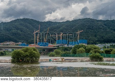 Daejeon, South Korea; August 9, 2020: For Editorial Use Only. Landscape Of Flooded River With Island