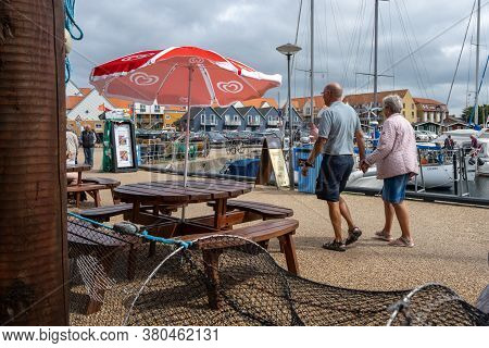 Hundested, Denmark - August 2, 2020: It Is Plenty Of Tourism Activities In The Marina. Due To The Co