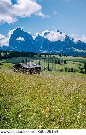 Alpe Di Siusi - Seiser Alm With Sassolungo - Langkofel Mountain Group In Background At Sunset. Yello