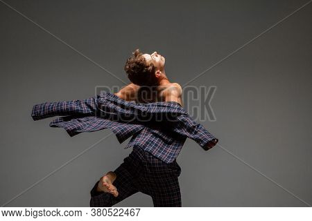 Stylish Young Guy Dancer In Suit Dancing Modern Expressive Dance In Studio. Dance School Poster. Dan