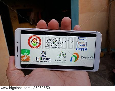 District Katni, India - 28 May 2020: An Indian Village Lady Holding Smart Phone With Displaying Mult