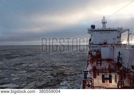 The Feed Of A Ship Sailing In The Arctic. Landscape Of The Arctic From The Deck Of The Tanker.
