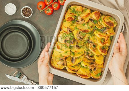 Potato Wedges Baked With Mushrooms, Herb Oven Roasted, With Thyme, A Close-up In A Baking Tray. Top 