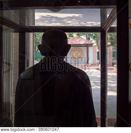 Delhi, India - March 15, 2019: Statue Mahatma Gandi Facing The Window Of The House He Walked Through