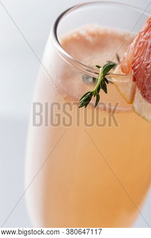 Detail Of Mimosa Cocktail In A Champagne Flute With Grapefruit Juice And Sparkling Wine Decorated Wi