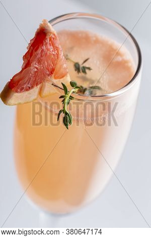 Detail Of Mimosa Cocktail In A Champagne Flute With Grapefruit Juice And Sparkling Wine Decorated Wi
